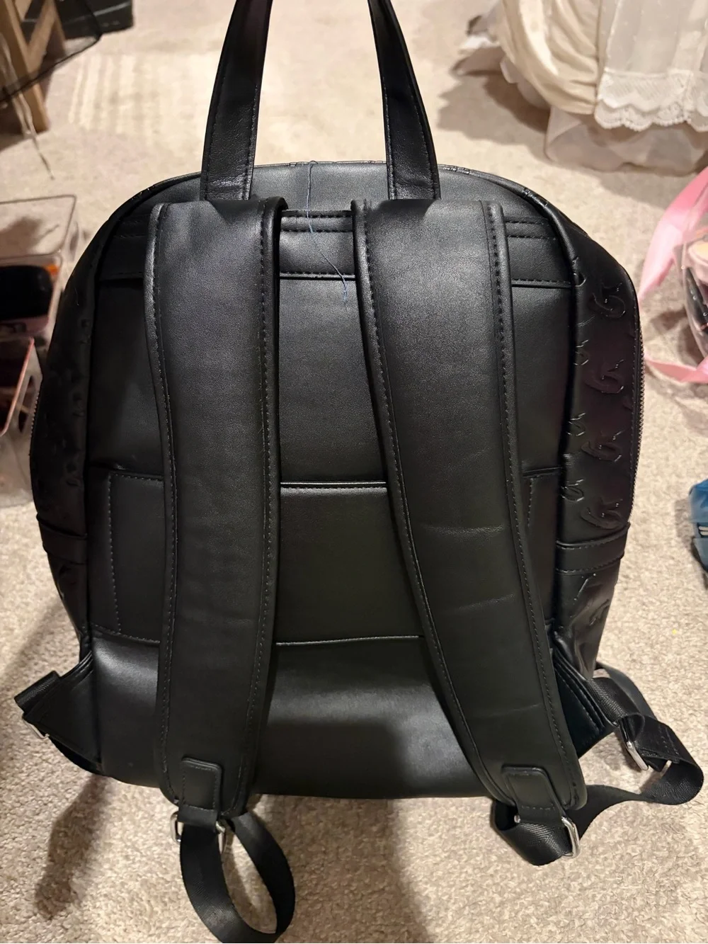 Monogram-Embossed Black Mini Backpack - Sleek Everyday Carry